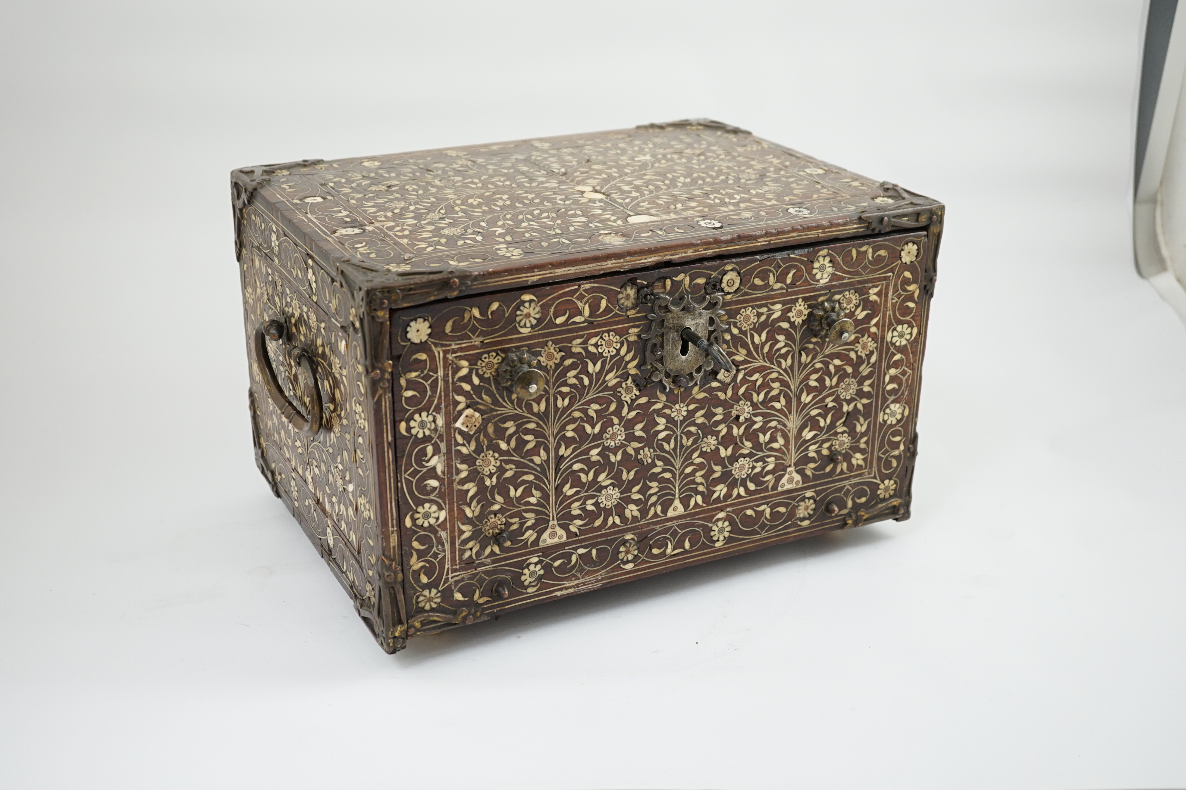 An early 17th century Indo-Portuguese ivory inset hardwood travelling chest